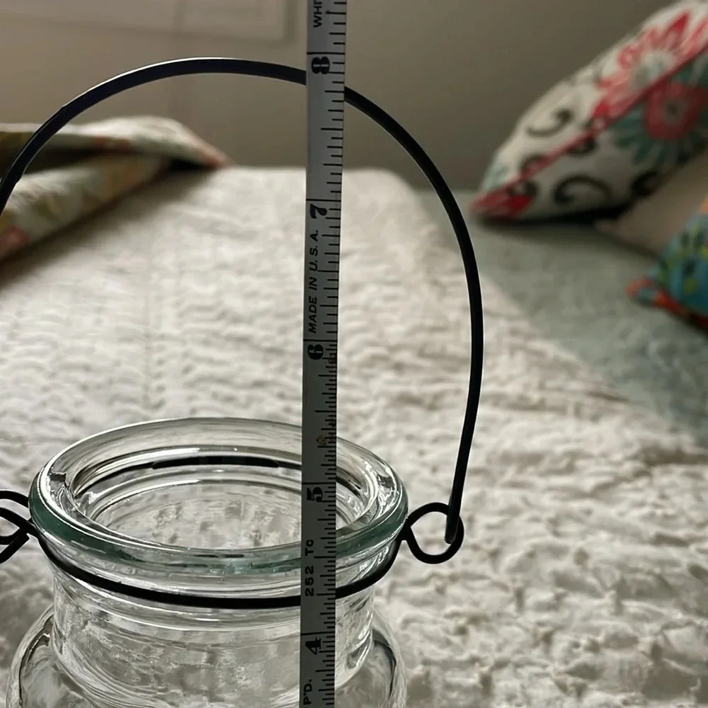 Clear Glass Jar 3D Star on Front. Black Metal Handle. Patio decor. Candle holder